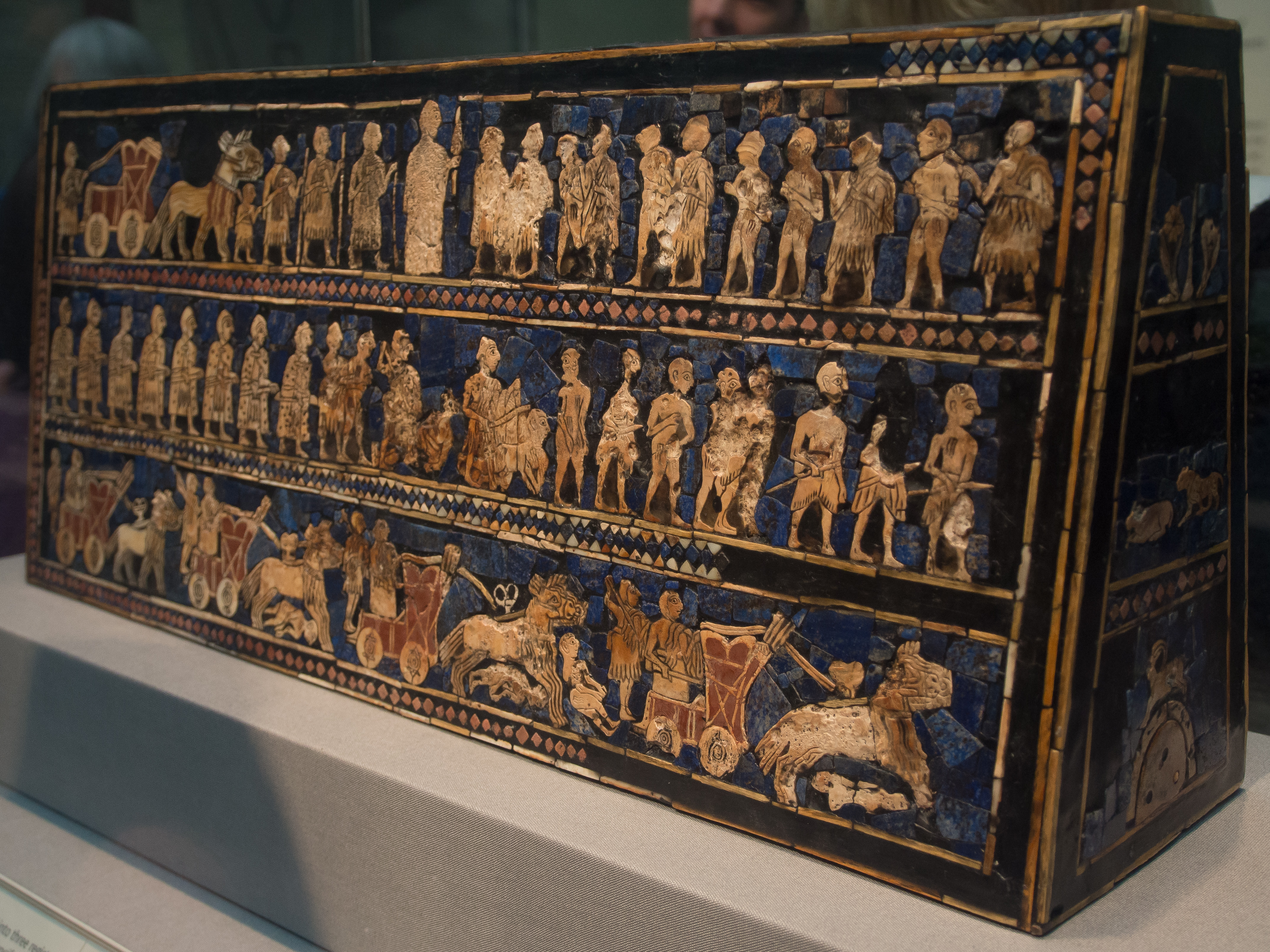 War side of the Standard of Ur showing chariots and captives